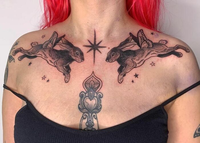 Two Rabbits with butterfly wings collarbone tattoo