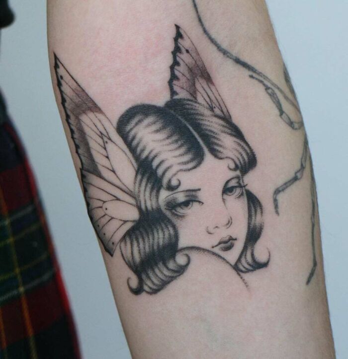 Butterfly Lady Face arm Tattoo