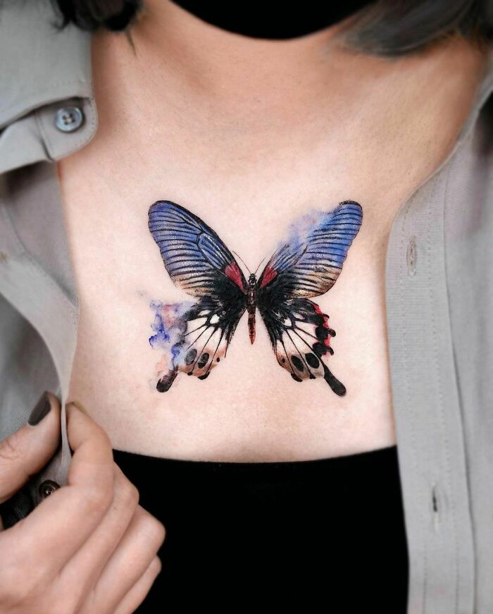 watercolor butterfly chest tattoo