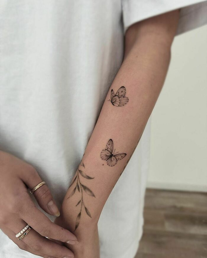 butterflies family arm tattoos