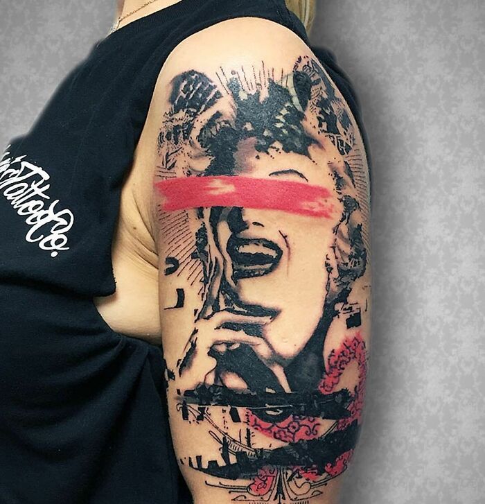 Marilyn Monroe black and red arm tattoo