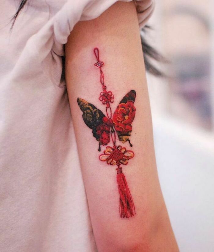 Red Butterfly With Flowers arm Tattoo