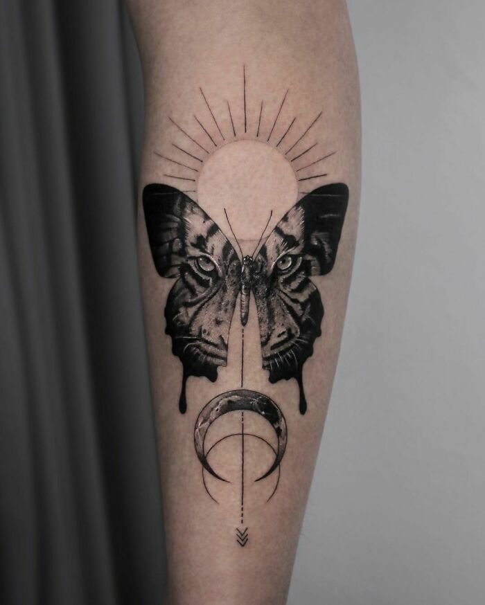 geometrical animal tiger and butterfly with sun arm tattoo
