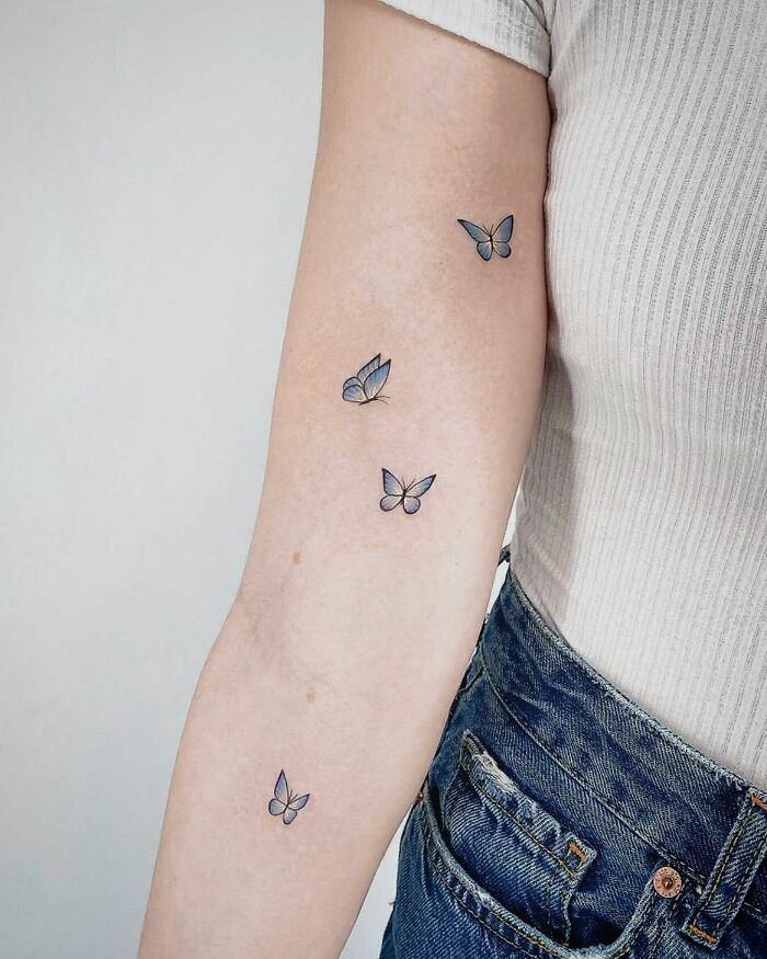 Small Blue Butterflies arm Tattoo