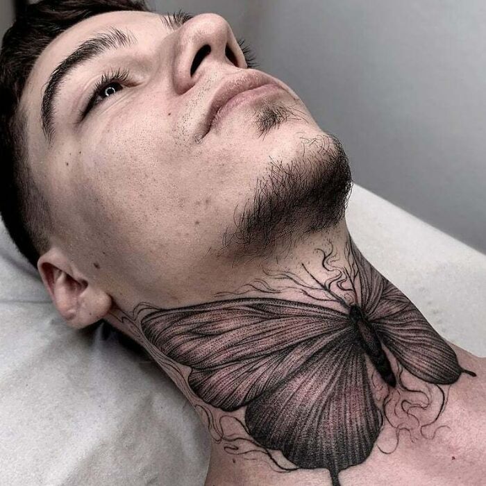 Big Butterfly Tattoo On The Neck