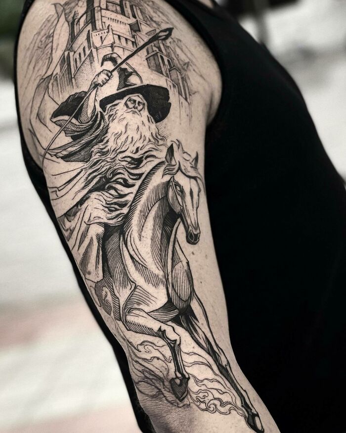 Gandalf with his staff riding a horse tattoo