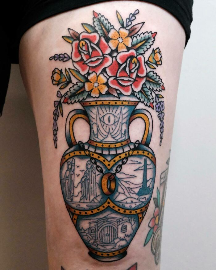 A Lord Of The Rings themed vase with flowers tattoo