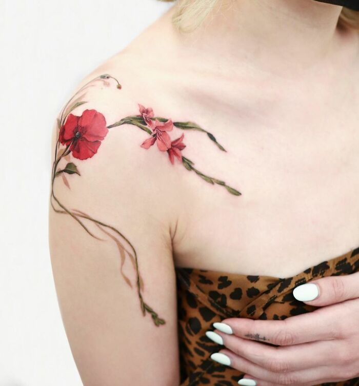 Flowy Flowers Coming From The Shoulder tattoo