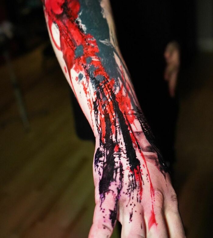 Abstract arm sleeve tattoo in progress