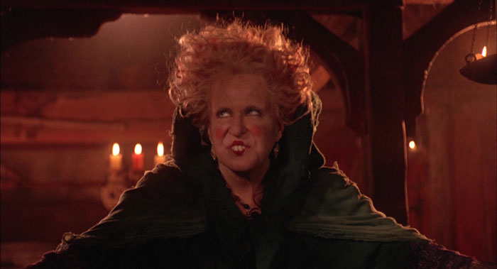 Winifred Sanderson in the background of candles