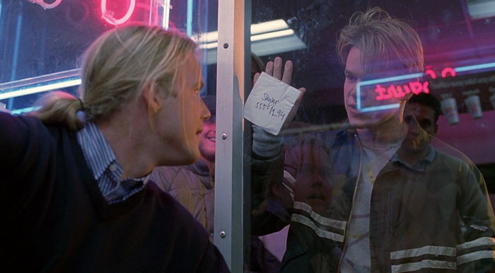 Will Hunting showing the paper with the phone number through a glass