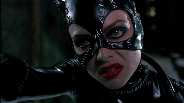 Catwoman with red lips close up