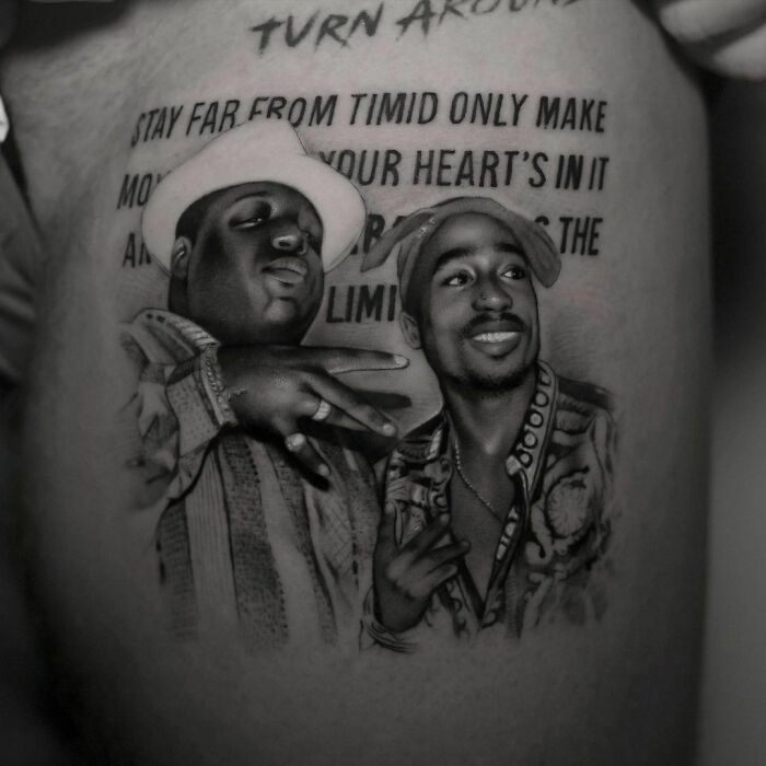 Pop culture tattoos featuring two iconic figures with text above, showcasing detailed artistry and design.