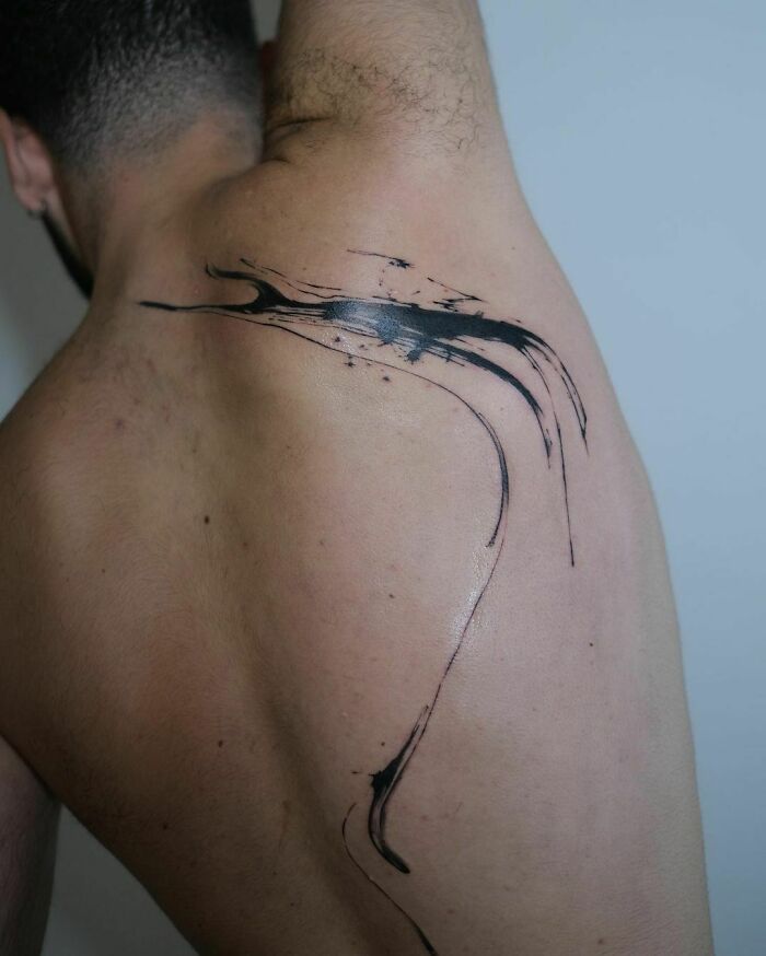 Back tattoo with abstract design by viral tattoo artist. Back tattoo with abstract design by viral tattoo artist.