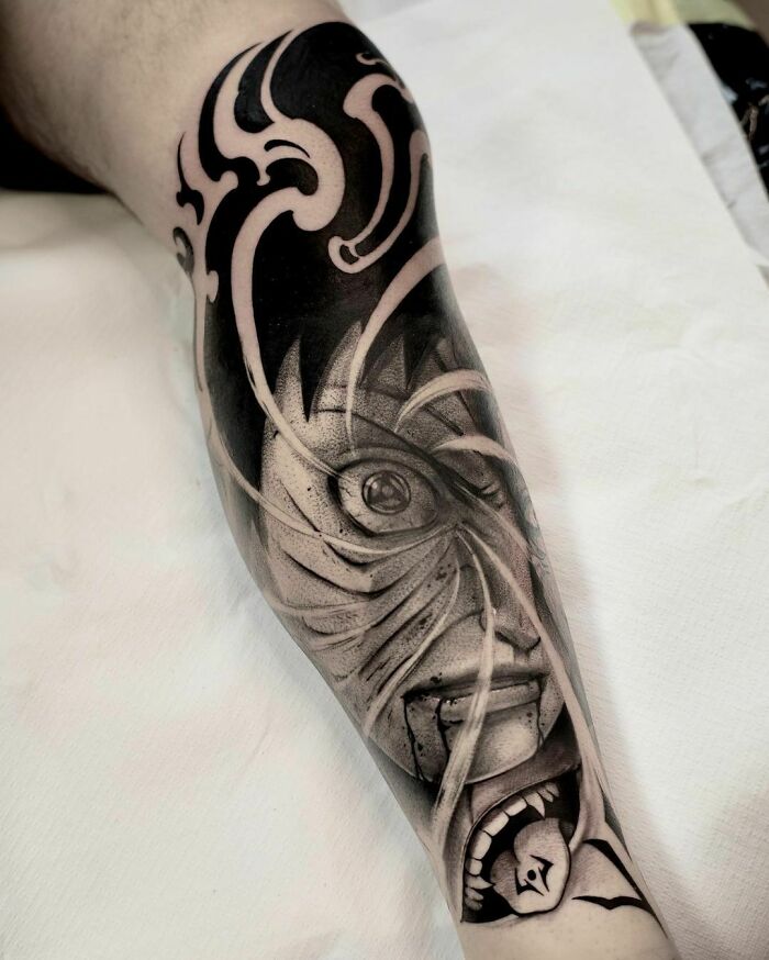 Tattoo featuring a detailed pop culture design with swirling patterns and a fierce face.