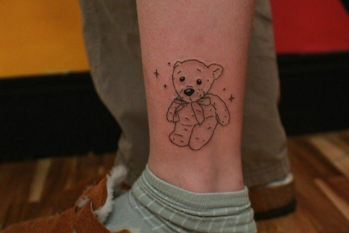 Plush toy ankle tattoo