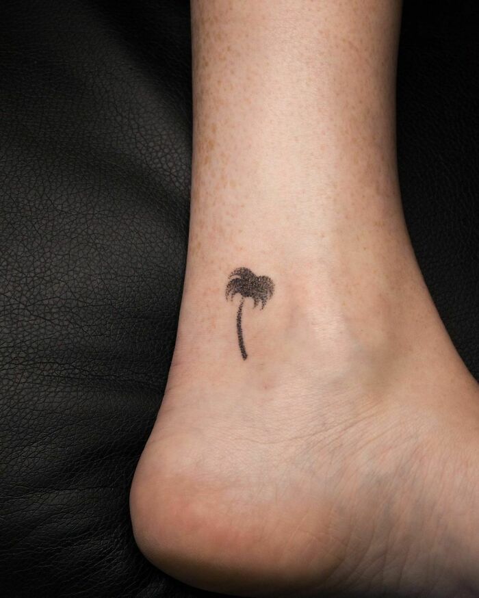 Palm tree ankle tattoo