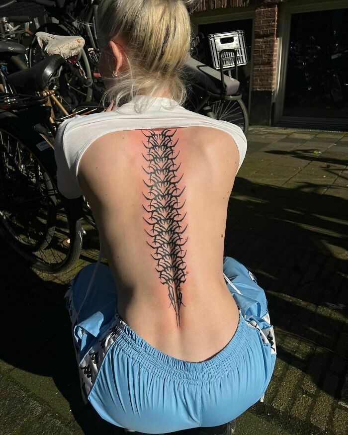 spine tribal tattoo