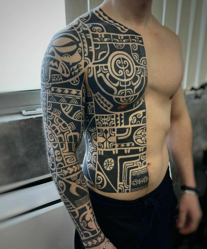 marquesan inspired half body sleeve tribal tattoo