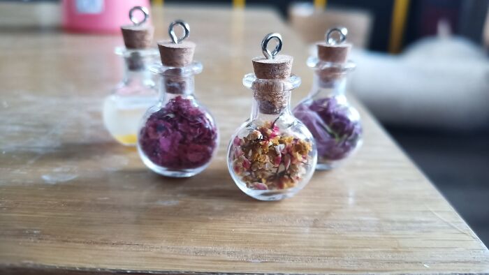 I Started Making These Miniature Bottle Necklaces(2,3cm) Filled With Flowers I've Grown In My Garden And Took (In My Opinion) A Really Cool Picture Of The First Four