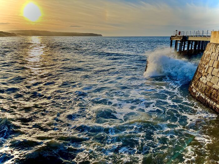 Sunset On A Foamy Sea