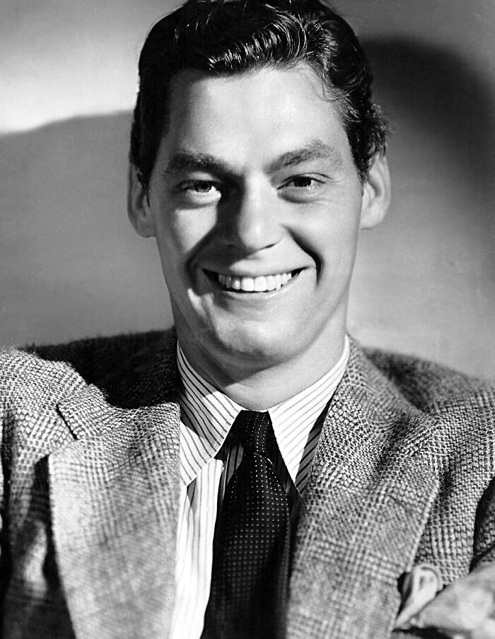 Johnny Weissmuller smiling