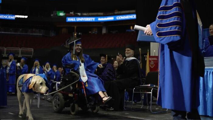 Video Showing A Service Dog Receiving A Diploma Alongside Owner With Disability Wins The Internet’s Hearts
