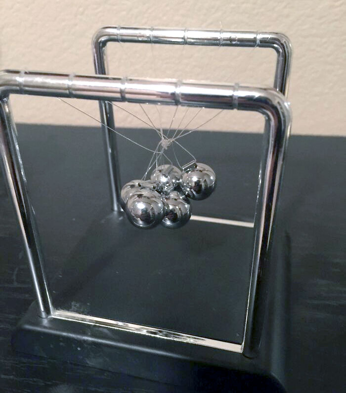 When Your 2-Year-Old Cousin Comes Over And Completely Messes Up Your Newton's Cradle