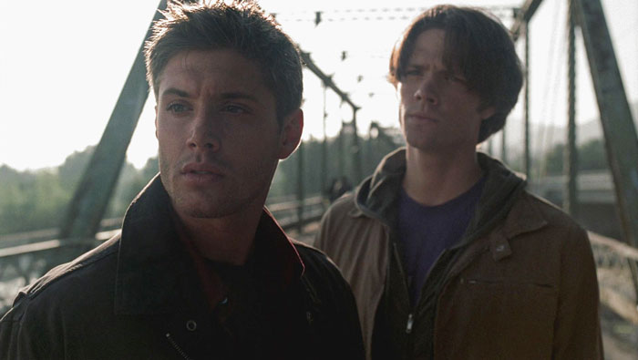 Dean Winchester and Castiel standing and looking pilot