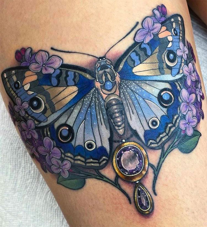 A Butterfly With Flowers arm Tattoo