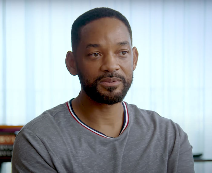 Will Smith looking at someone and talking 