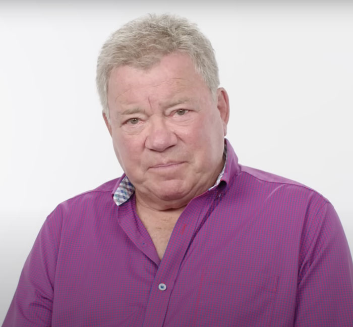William Shatner talking and looking at someone 