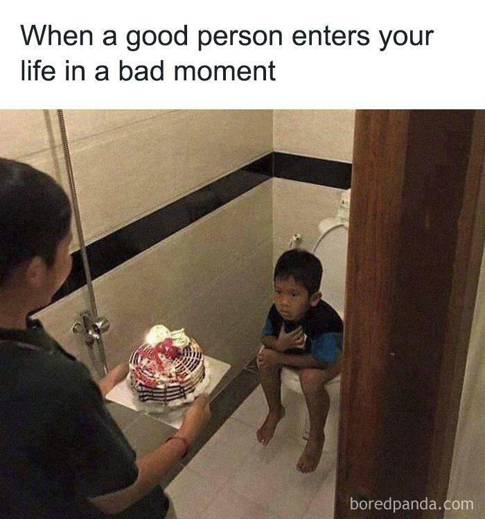Child sitting on toilet looking surprised while another child offers a birthday cake, relatable introvert memes moment