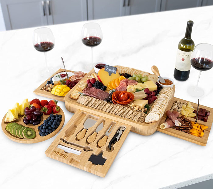 Charcuterie Boards next to wine 