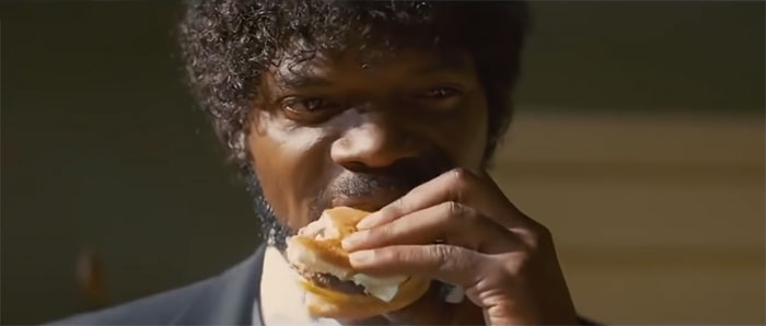 Jules Winnfield from Pulp Fiction eating a burger