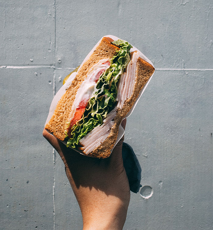 Sandwich in hand