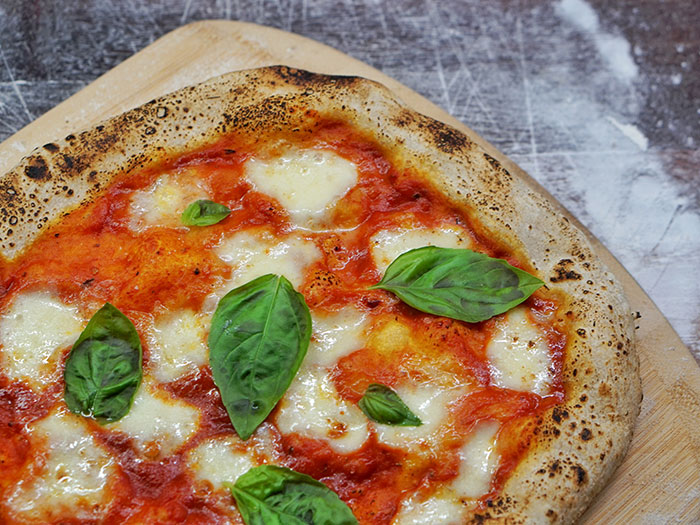 Pizza Margherita with tomato, mozzarella and basil