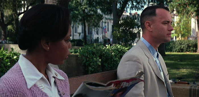 Forrest Gump talking with woman on a bench 