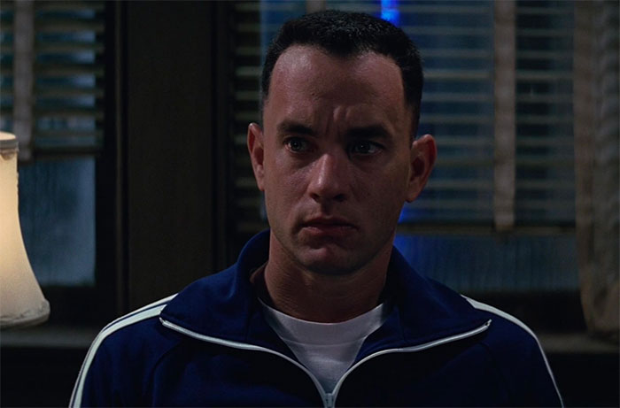 Forrest Gump wearing blue jogging suit