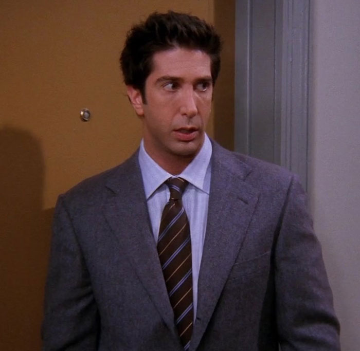Ross wearing grey suite 