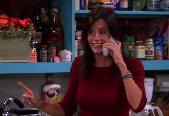 Monica talking on the phone 