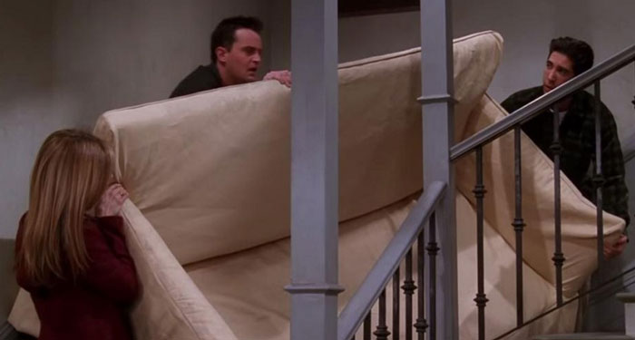 Ross, Rachel and Chandler pivoting the couch 