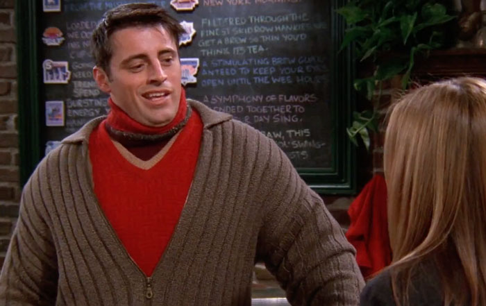Joey wearing six sweaters 