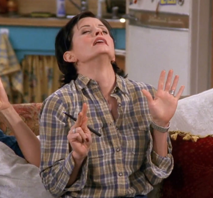 Monica showing gesture "seven" 