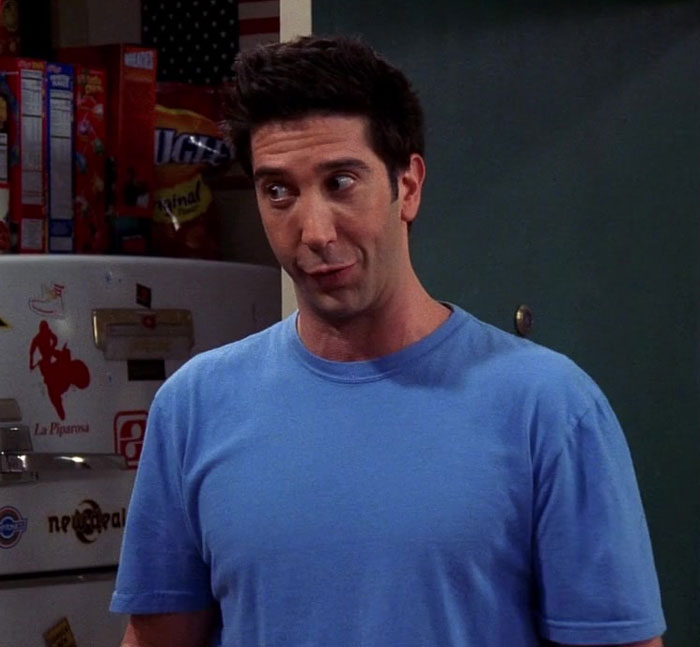 Ross wearing blue t-shirt 