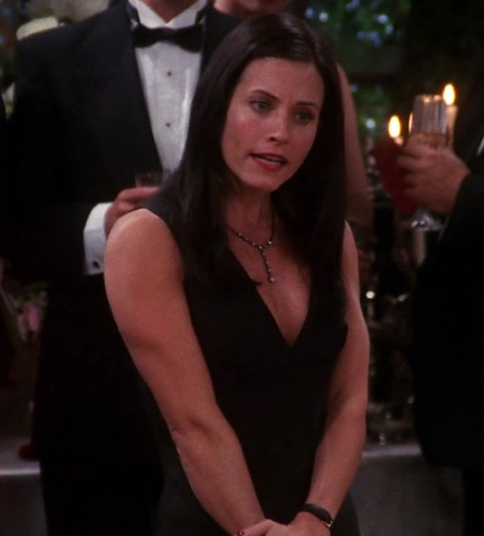 Monica is giving a speech at her birthday party 