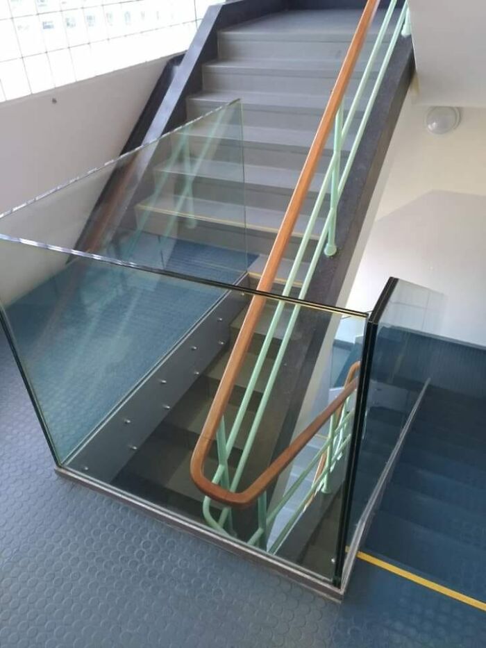 Wider Set Of Stairs With No Actual Handrailings And Thinner Set Of Stairs With A Handrail That Nobody Could Fit Through