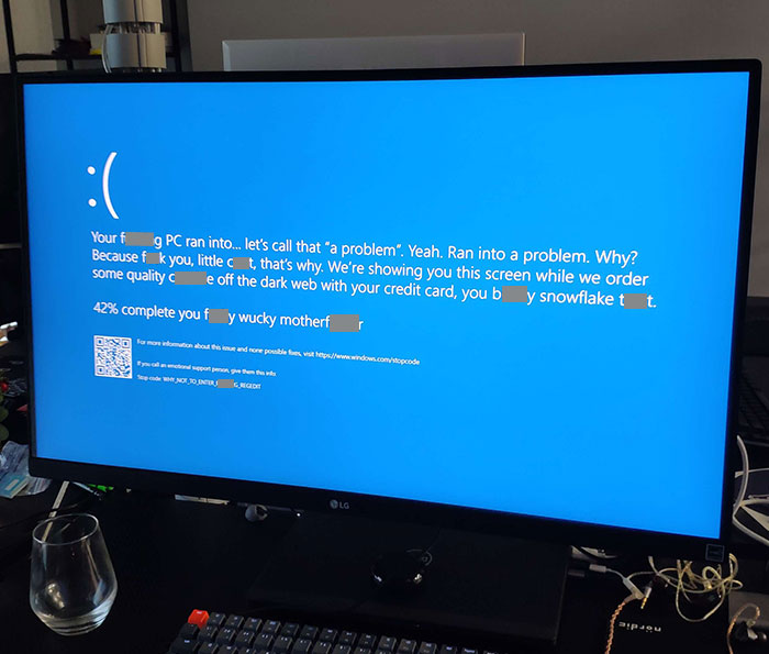 Coworker's Screen Saver. For Context, It Looks Like A Usual Error Windows Give When Something Goes Wrong, But The Text Is Different