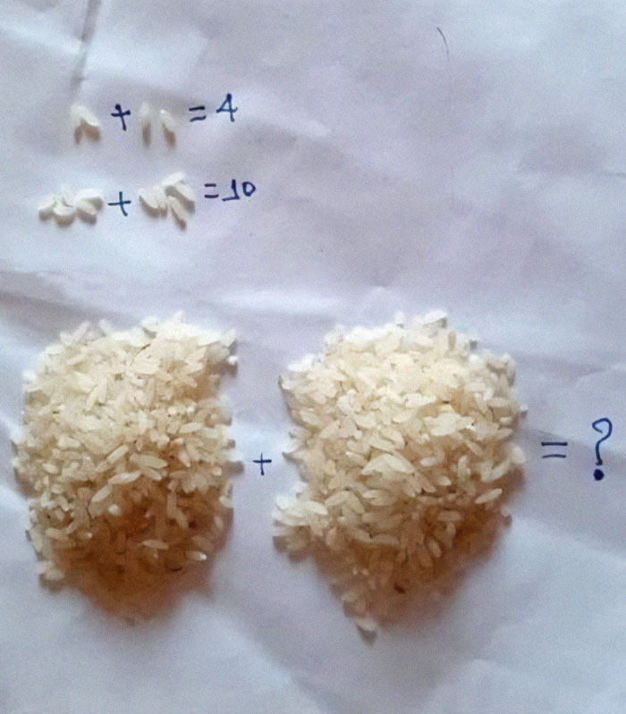 Math meme with rice piles representing an equation, humorously challenging basic math understanding.