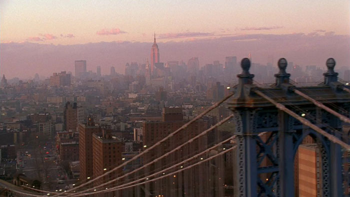 Manhattan bridge and the Empire State Building during sunrise 